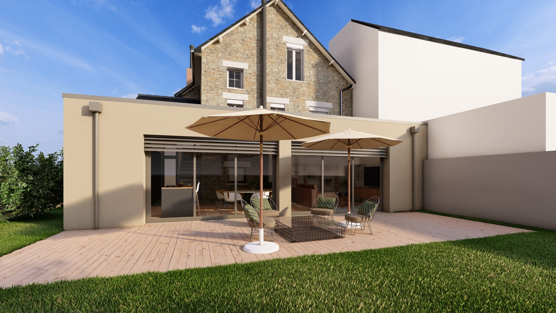 Façade et terrasse avec salon d'été de l'extension d'une maison à Rennes réalisé par Phenome